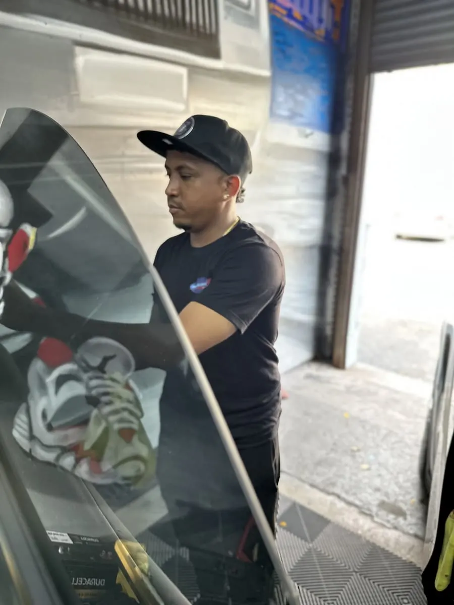 Galaxi Sound technician at work — Miami custom car shop since 1994